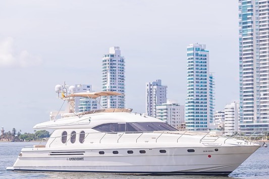 A yacht in front of the Bocagrande towers
